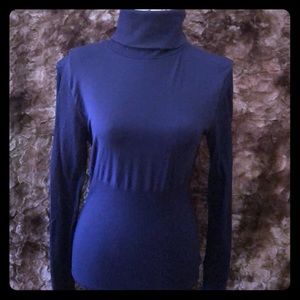 Bebe blue fitted turtleneck size M